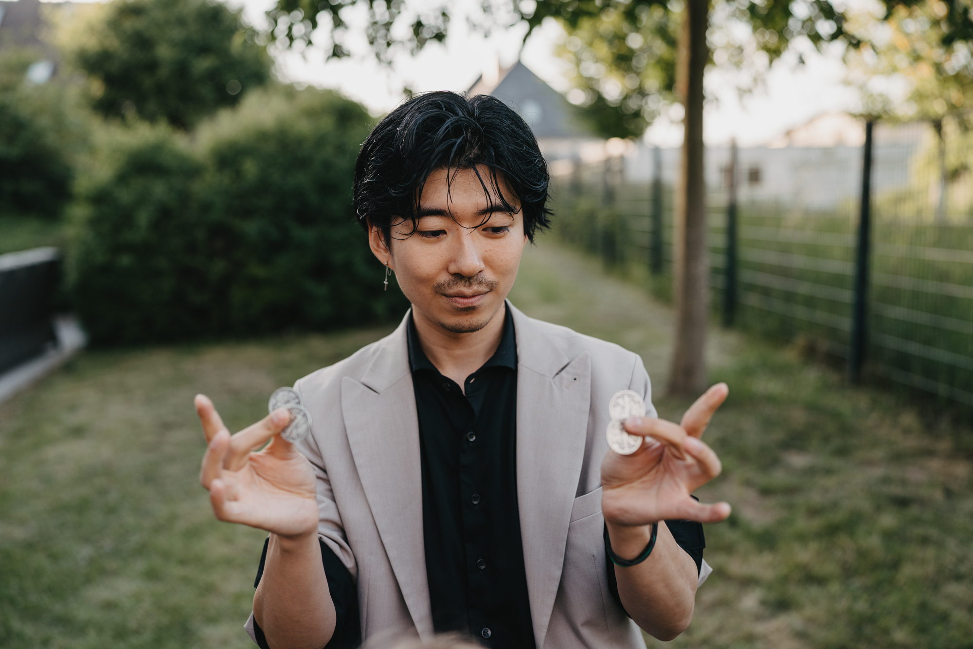 Münzentricks mit Tatto bei einem Event in Frankfurt